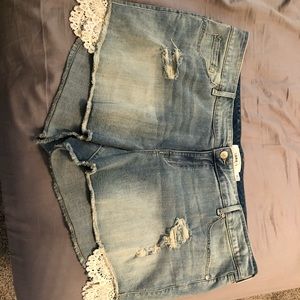 Never been worn jean shorts with cute white lace!